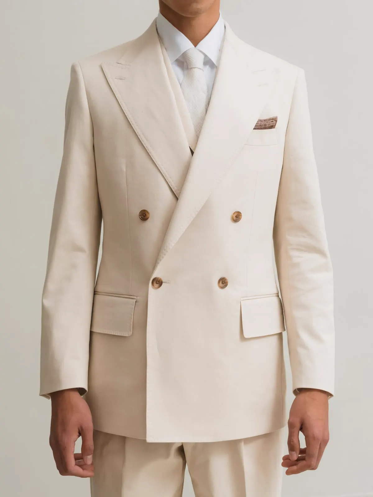 Off-white double-breasted suit with pocket square
