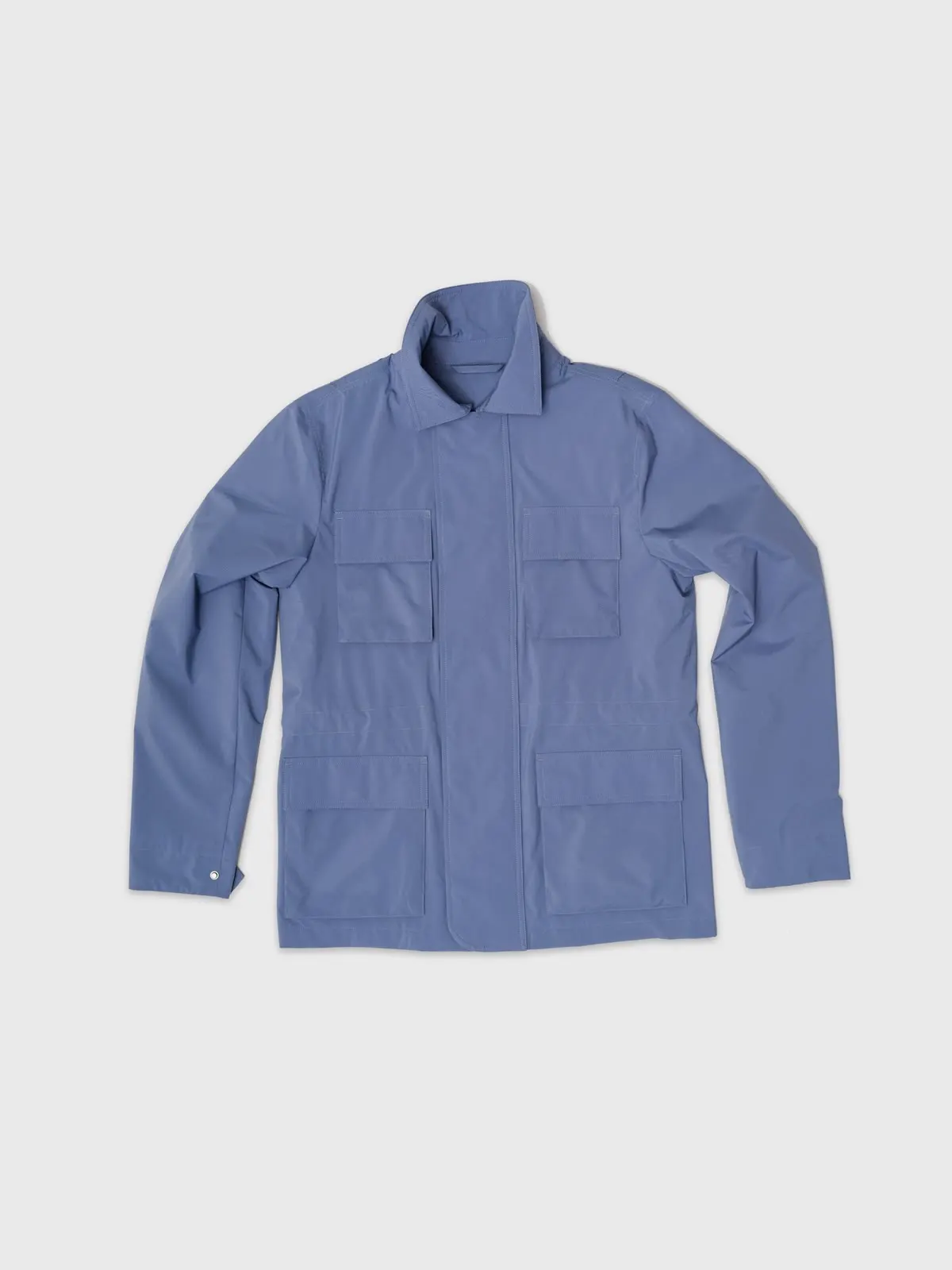 Lyseblå field jacket med ståkrave og lommer