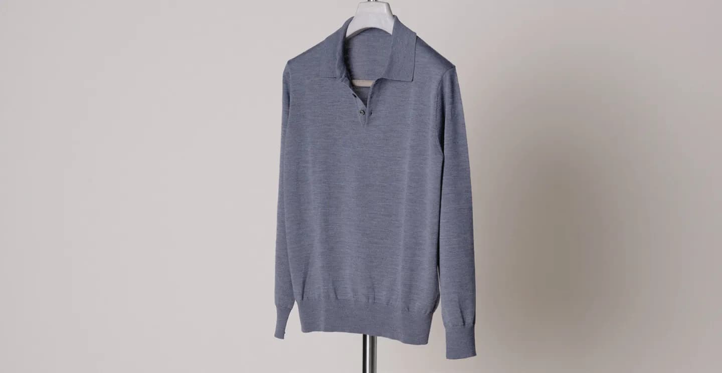Grå langærmet merino-polo på bøjle