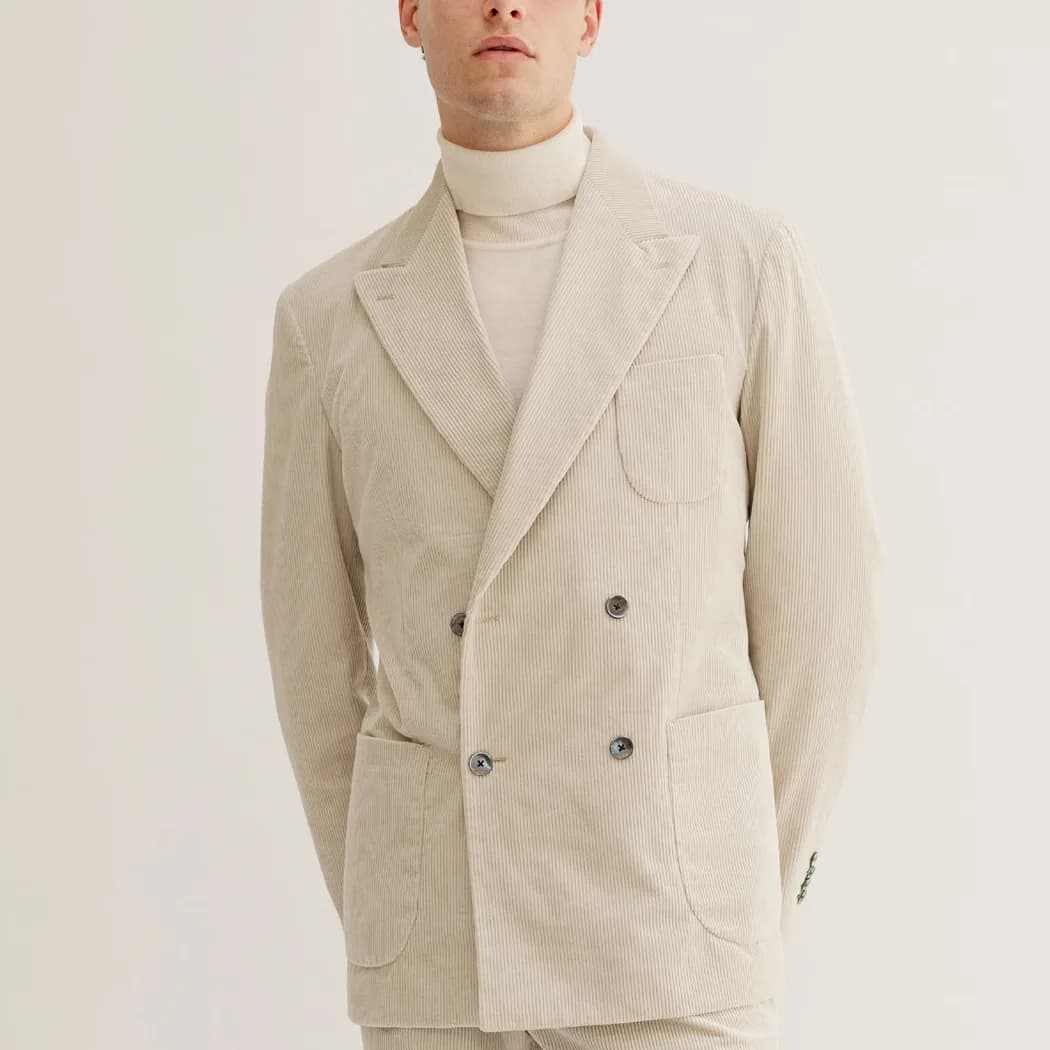 Off-white rullekrave i merino under lys fløjlshabit