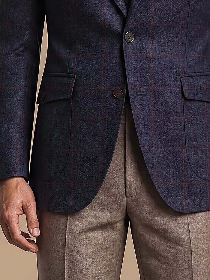 Marineblå og rødbrun windowpane blazer, detalje af lommen