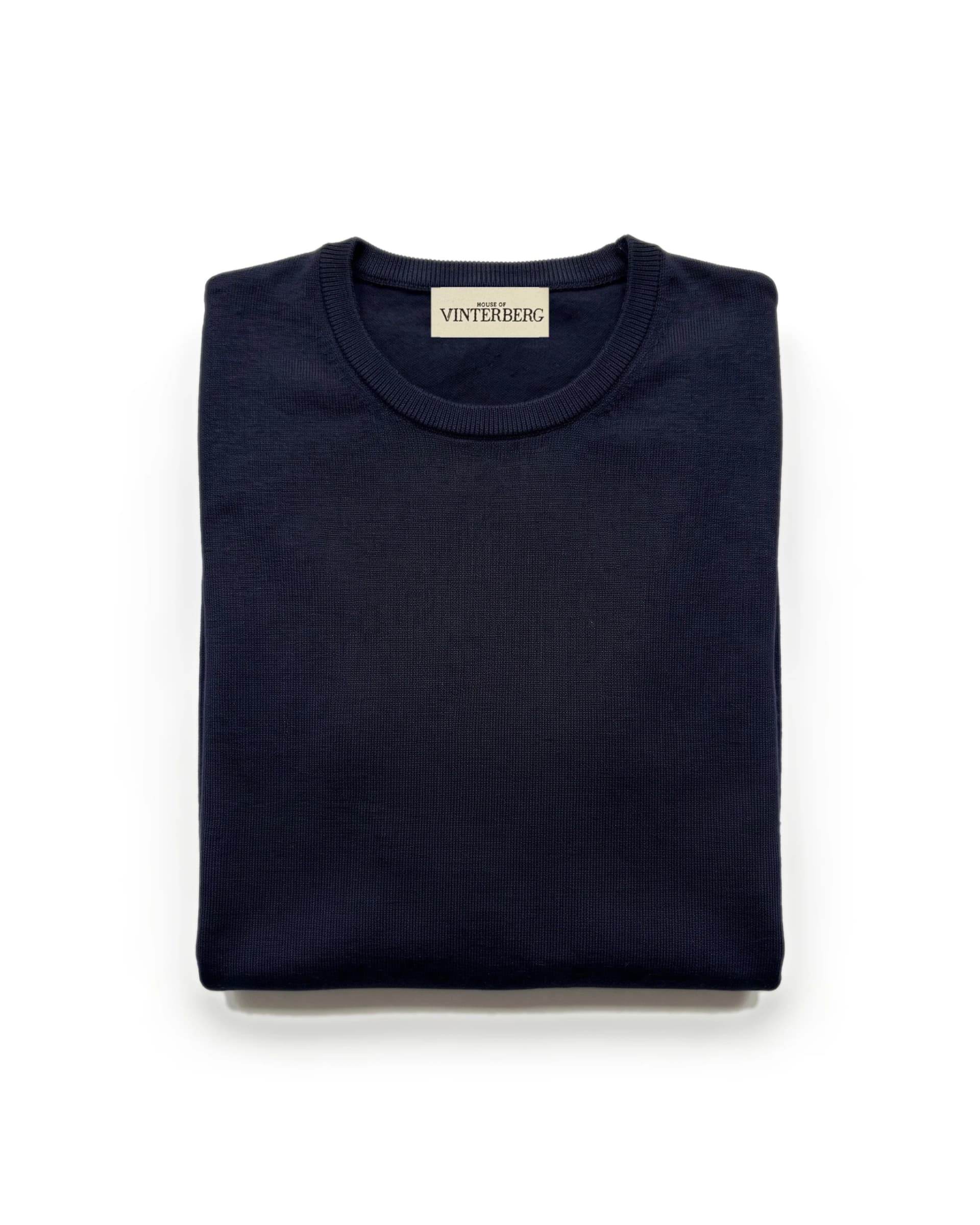 Navy crewneck i Merino Uld, foldet