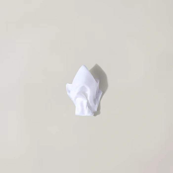 Folding a pocket square into a puff - step 4