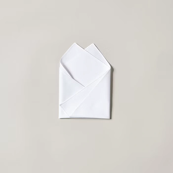 Folding a pocket square into two points - step 4