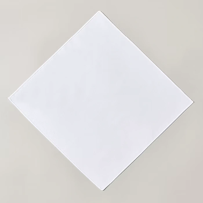 Folding a pocket square into three points - step 1