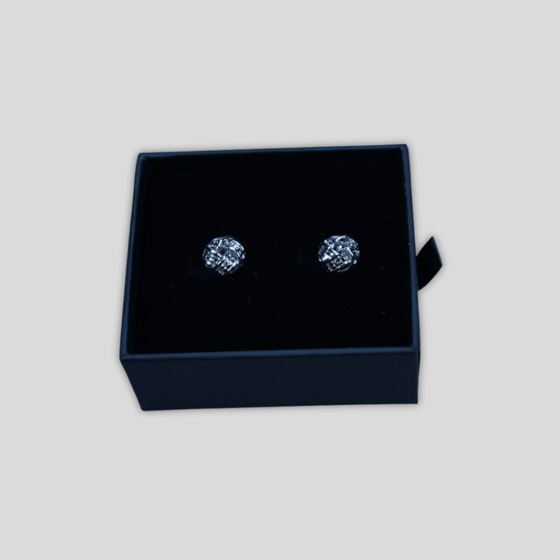 Flettede manchetknapper i sølv 2x2 bred