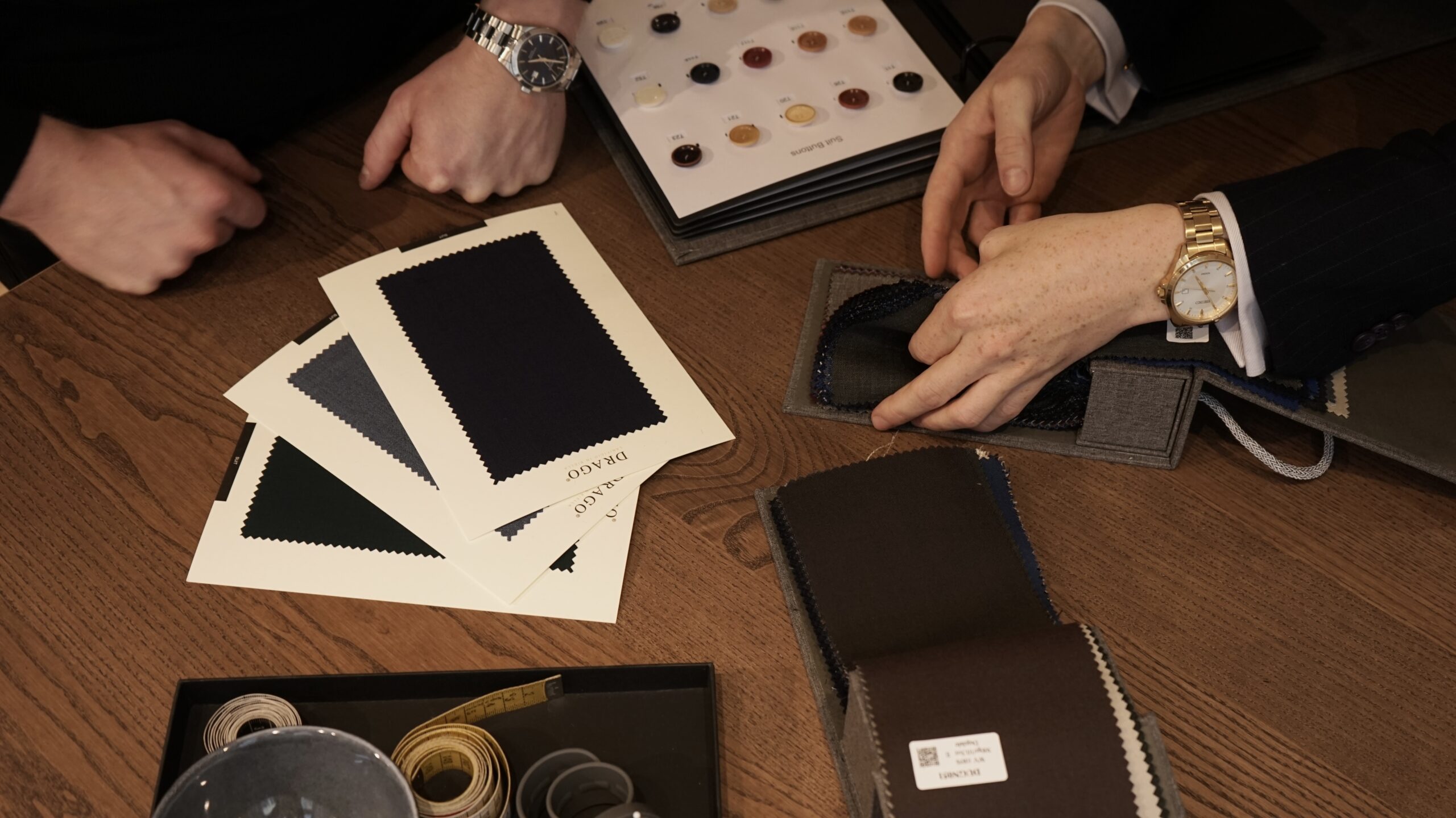 Suit garments on table for client house of vinterberg1