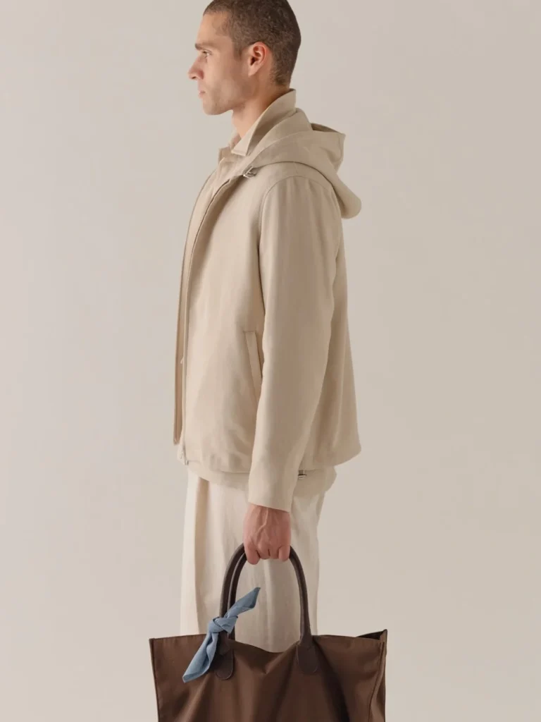 Casual outfit with large tote bag.